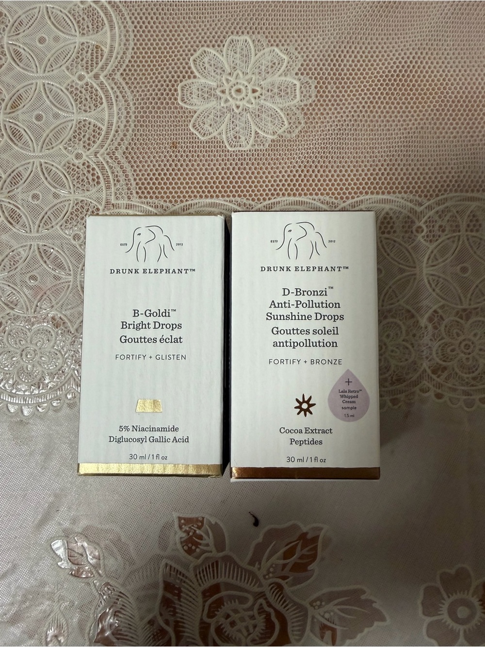 Drunk Elephant B-Goldi & D-Bronzi Drops Duo in White and Gold